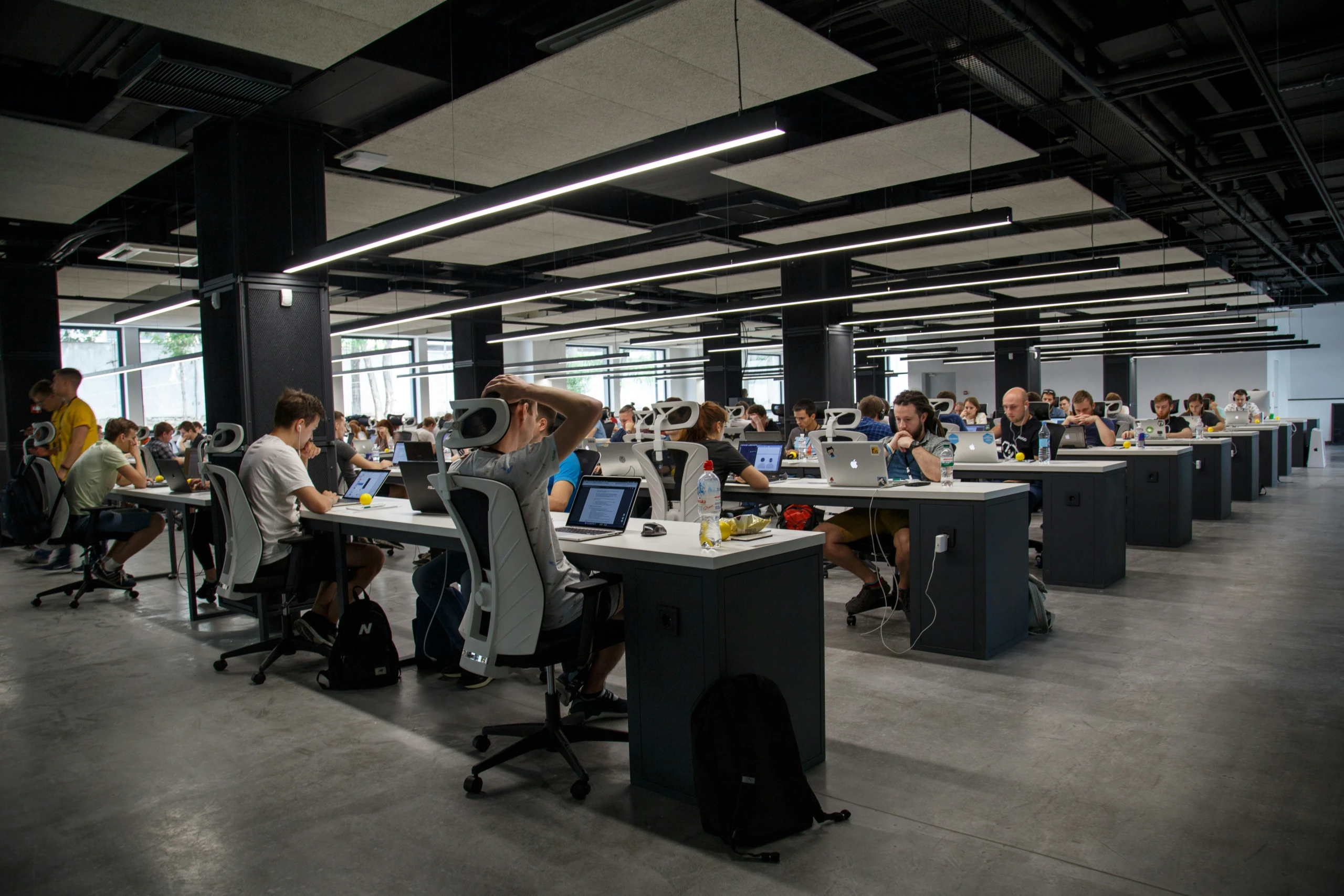 Employees working at a desk in an office